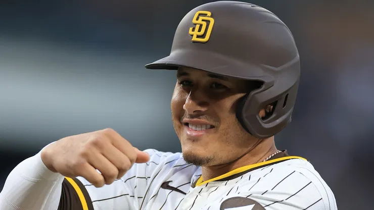 Manny Machado #13 of the San Diego Padres reacts at first base after connecting for a single during the fourth inning of a game against the Arizona Diamondbacks at Petco Park on July 07, 2025 in San Diego, California. This was Machado's 2000th career base hit.