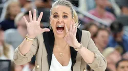 Head coach Becky Hammon of the Las Vegas Aces yells to one of her players in the third quarter of their game against the Indiana Fever at T-Mobile Arena on June 22, 2025 in Las Vegas, Nevada. The Aces defeated the Fever 89-81.