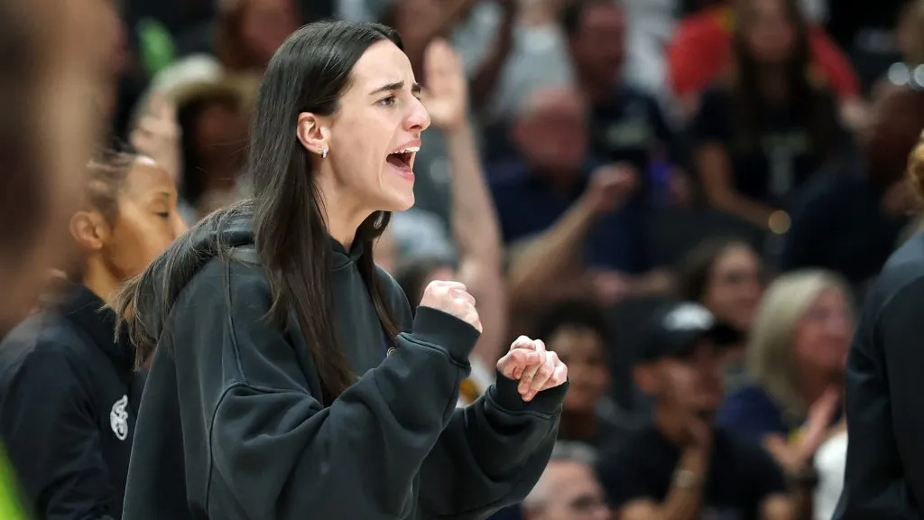 Caitlin Clark celebrates in the sidelines (Stacy Revere/Getty Images)