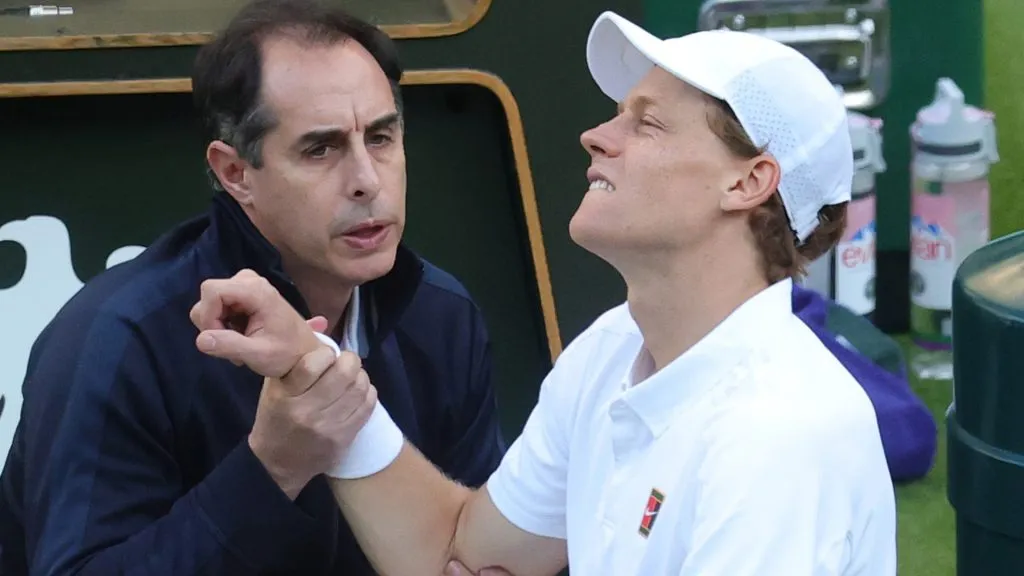 Jannik Sinner receives medical attention during his Round of 16 match against Grigor Dimitrov (Julian Finney/Getty Images)