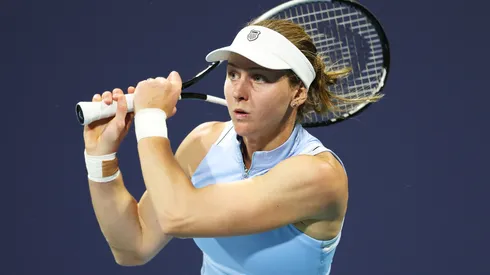Liudmila Samsonova returns a shot against Naomi Osaka of Japan during Day 3 of the Miami Open at Hard Rock Stadium on March 20, 2025.
