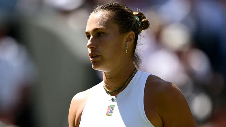 Aryna Sabalenka celebrates against Laura Siegemund of Germany during Wimbledon quarterfinals.