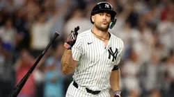 Giancarlo Stanton #27 of the New York Yankees flips his bat after hitting a three-run home run in the sixth inning against the Seattle Mariners at Yankee Stadium on July 08, 2025 in New York City.