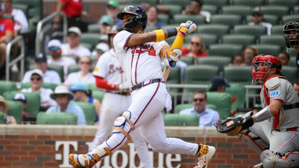 Ronald Acuña Jr. #13 of the Atlanta Braves hits a single in the fifth inning of a game against the Philadelphia Phillies at Truist Park on June 29, 2025 in Atlanta, Georgia. (Photo by Edward M. Pio Roda/Getty Images)