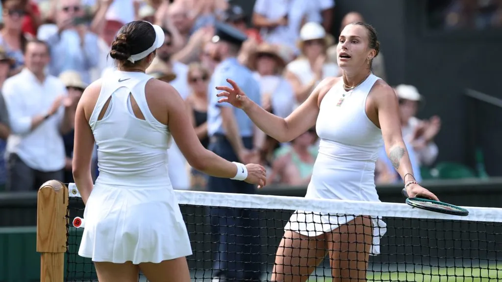 Amanda Amisinova and Aryna Sabalenka greet each other after the match (Getty Images)