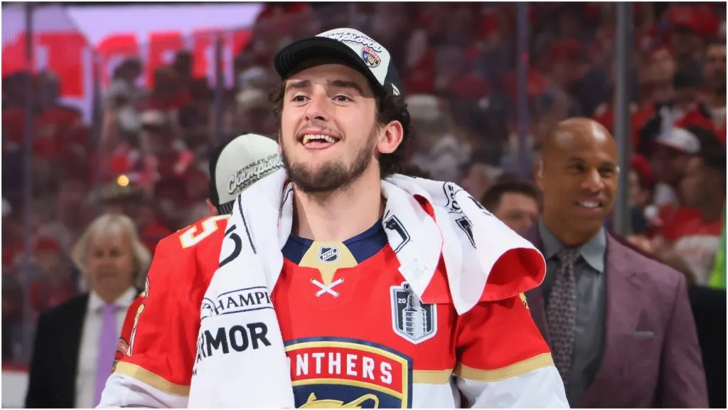 Mackie Samoskevich #25 of the Florida Panthers celebrates with the Stanley Cup following the Cup win against the Edmonton Oilers in Game Six of the 2025 NHL Stanley Cup Final at Amerant Bank Arena on June 17, 2025 in Sunrise, Florida.