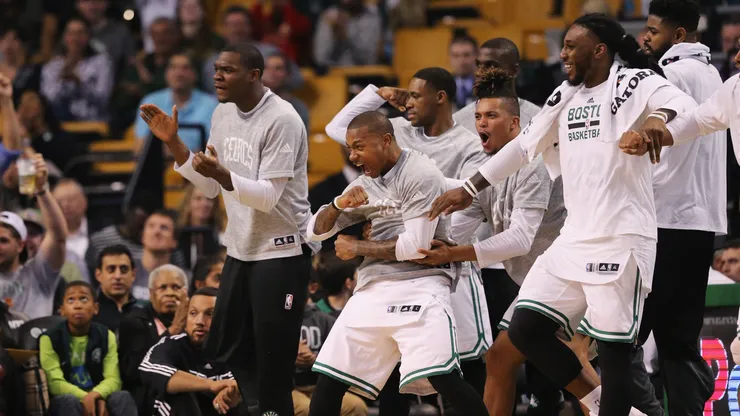 Members of the Boston Celtics celebrate on the bench during the third quarter of the preseason game against the Brooklyn Nets at TD Garden on October 17, 2016 in Boston, Massachusetts