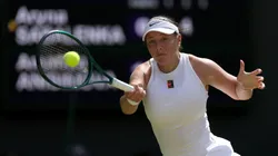 Amanda Anisimova of United States plays a forehand against Aryna Sabalenka during Wimbledon semifinal.