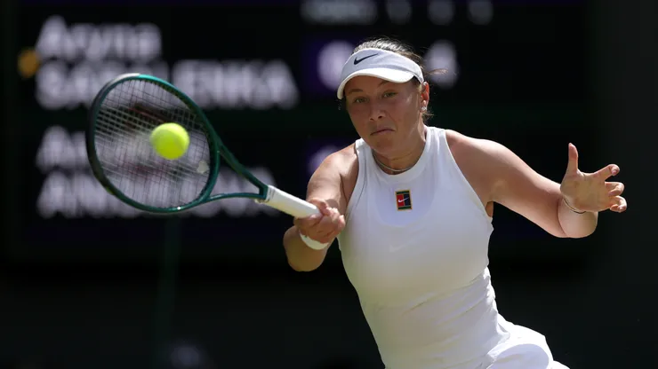 Amanda Anisimova of United States plays a forehand against Aryna Sabalenka during Wimbledon semifinal.