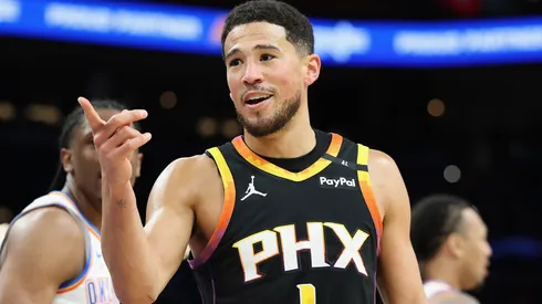 Devin Booker #1 of the Phoenix Suns reacts during the second half of the NBA game at PHX Arena.