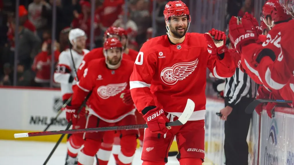 Joe Veleno #90 of the Detroit Red Wings celebrates his third period goal with teammates while playing the Ottawa Senators at Little Caesars Arena on January 07, 2025 in Detroit, Michigan. (Photo by Gregory Shamus/Getty Images)