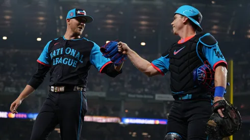 Jeff Hoffman #23 of the Philadelphia Phillies celebrates with Will Smith #16 of the Los Angeles Dodgers at the end of the eighth inning against the American League during the 94th MLB All-Star Game in 2024.