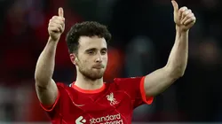 Diogo Jota of Liverpool acknowledges the fans after victory in the Premier League match between Liverpool and Leicester City at Anfield on February 10, 2022 in Liverpool, England.