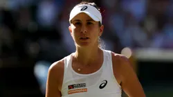 Belinda Bencic of Switzerland reacts against Iga Swiatek of Poland during the Wimbledon semifinals.