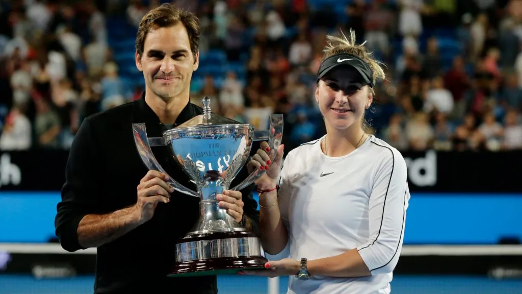 Roger Federer and Belinda Bencic of Switzerland with the Hopman Cup. (Will Russell/Getty Images)