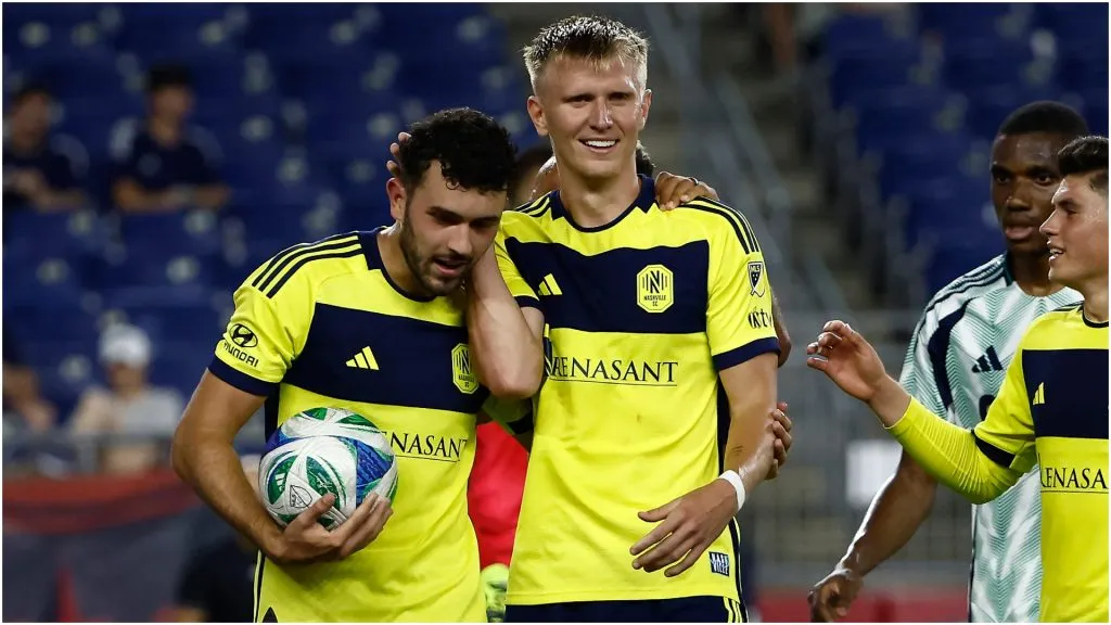 Sam Surridge of Nashville SC smiles as he is congratulated by Patrick Yazbek – Winslow Townson/Getty Images