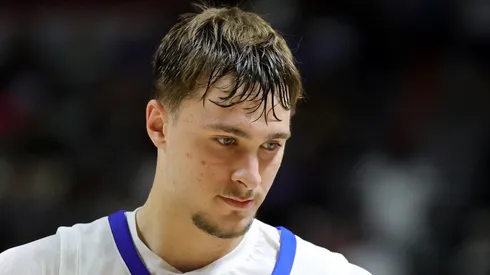 Cooper Flagg #32 of the Dallas Mavericks walks on the court during a break in the first half of a 2025 NBA Summer League game against the Los Angeles Lakers.