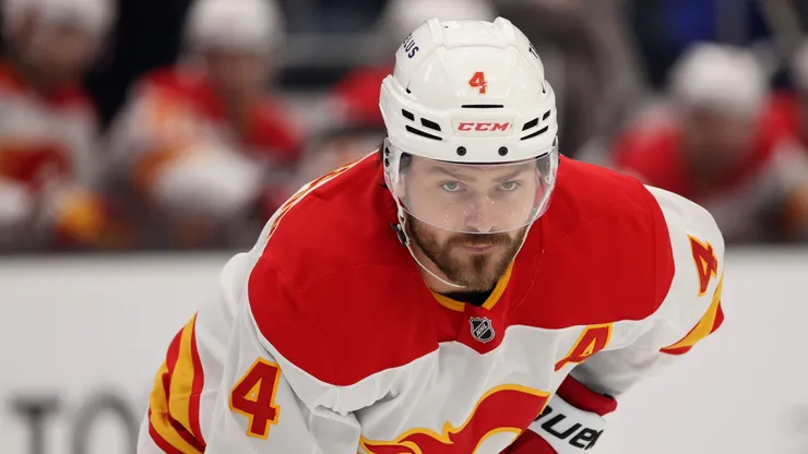 Rasmus Andersson #4 of the Calgary Flames looks on during the first period against the Seattle Kraken at Climate Pledge Arena on February 02, 2025 in Seattle, Washington.