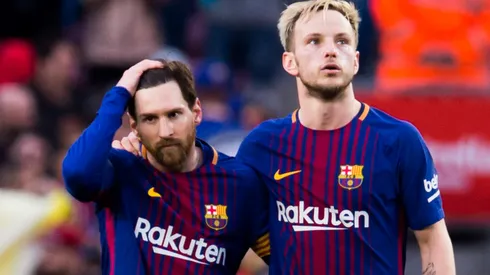 Lionel Messi and Ivan Rakitic of FC Barcelona celebrate victory after the La Liga match between Barcelona and Atletico Madrid at Camp Nou on March 4, 2018 in Barcelona, Spain.