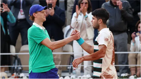 Carlos Alcaraz of Spain greets Jannik Sinner of Italy after Roland Garros final.