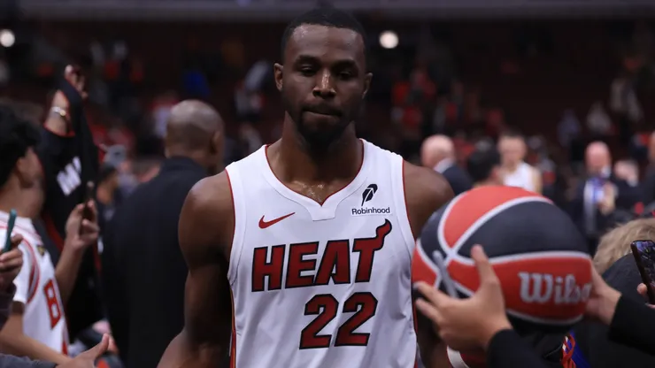 Andrew Wiggins #22 of the Miami Heat interacts with fans.