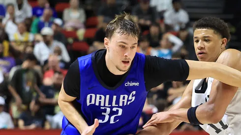 Cooper Flagg #32 of the Dallas Mavericks is fouled by Carter Bryant #11 of the San Antonio Spurs in the second half of a 2025 NBA Summer League