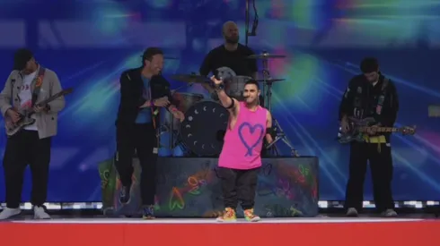 Emmanuel Kelly and Coldplay at the FIFA Club World Cup halftime show in 2025.