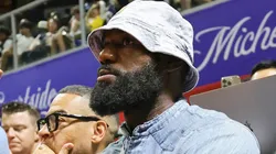 LeBron James of the Los Angeles Lakers throws the ball back to a referee as he attends a 2025 NBA Summer League game between the Lakers and the New Orleans Pelicans.