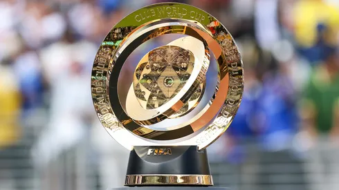 A detailed view of the FIFA Club World Cup trophy is seen on the pitch following the FIFA Club World Cup 2025 Final match between Chelsea FC and Paris Saint-Germain.