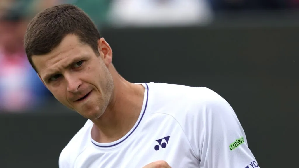 Hubert Hurkacz celebrates winning match point against Radu Albot of Moldova in his Gentlemen’s Singles first round match during day two of The Championships Wimbledon 2024. (Source: Clive Brunskill/Getty Images)