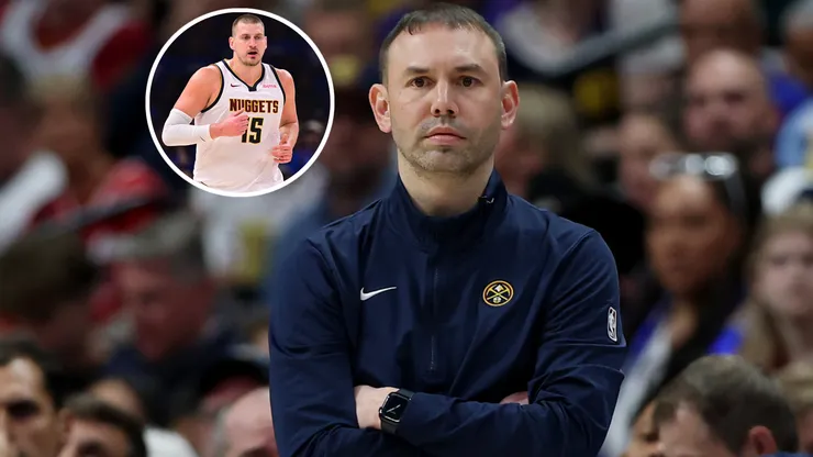 Head coach David Adelman of the Denver Nuggets and Nikola Jokic.