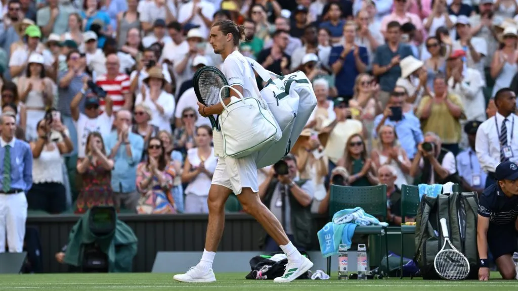 Alexander Zverev of Germany leaves the court following defeat against Arthur Rinderknech of France during Wimbledon. (Hannah Peters/Getty Images)