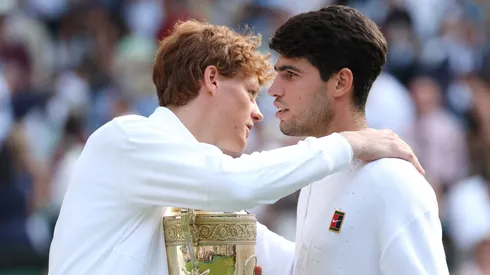 Jannik Sinner embraces Carlos Alcaraz after the final of Wimbledon 2025