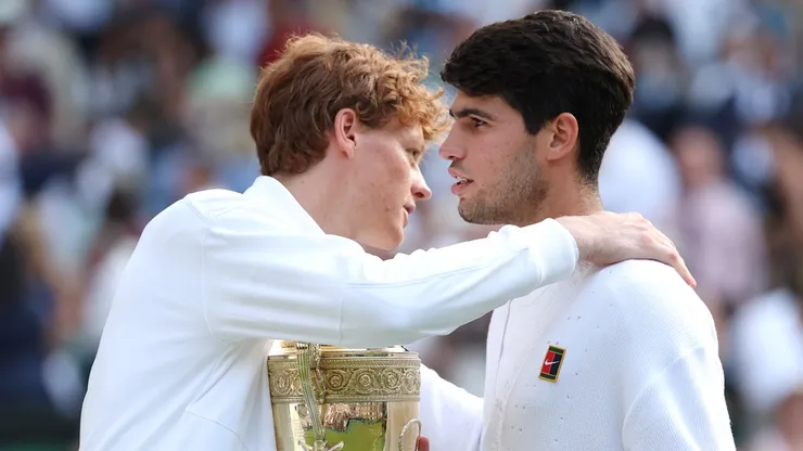 Jannik Sinner embraces Carlos Alcaraz after the final of Wimbledon 2025