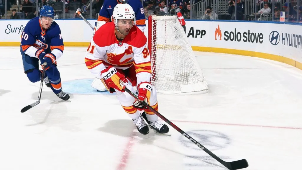 Nazem Kadri #91 of the Calgary Flames skates against the New York Islanders at UBS Arena on March 22, 2025 in Elmont, New York. (Photo by Bruce Bennett/Getty Images)