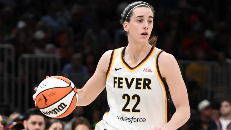 Caitlin Clark #22 of the Indiana Fever drives to the basket against the Connecticut Sun during the first half at the TD Garden on July 15, 2025 in Boston, Massachusetts.