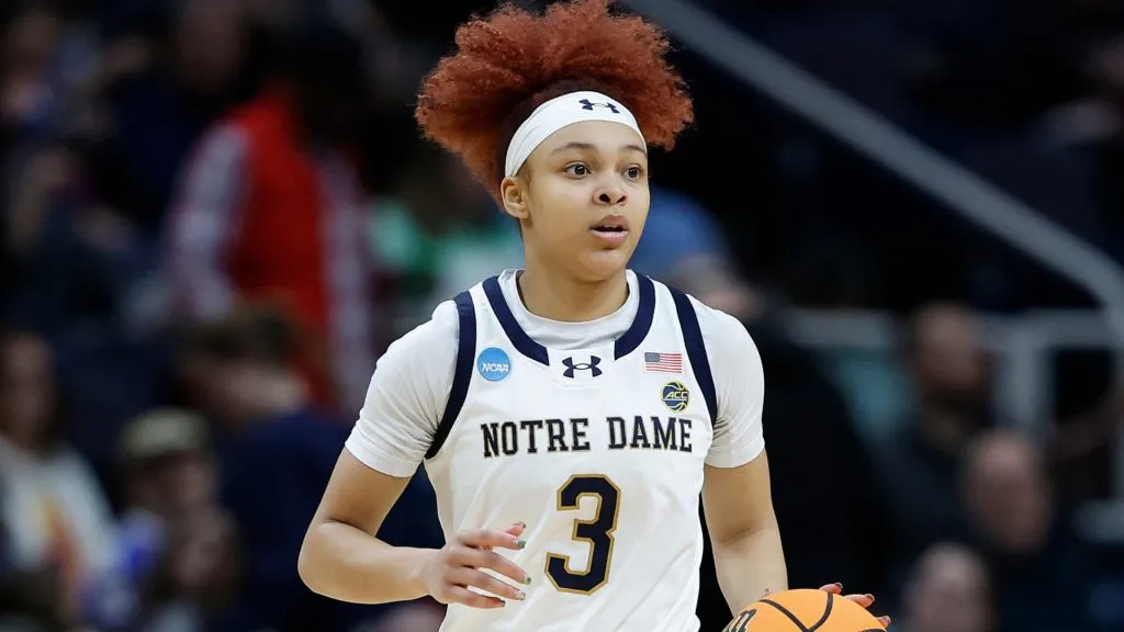 Hannah Hidalgo brings the ball up court against the Oregon State Beavers during the second half in the Sweet 16 round of the NCAA Women’s Basketball Tournament. (Source: Sarah Stier/Getty Images)