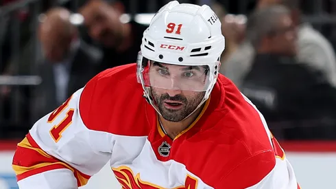 Nazem Kadri #91 of the Calgary Flames takes the puck during the third period against the New Jersey Devils at Prudential Center on March 20, 2025 in Newark, New Jersey.