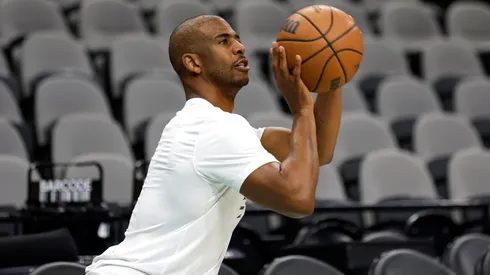 Chris Paul #3 of the San Antonio Spurs takes warm up shots before their game against the Toronto Raptors at Frost Bank Center on April 13, 2025 in San Antonio, Texas.