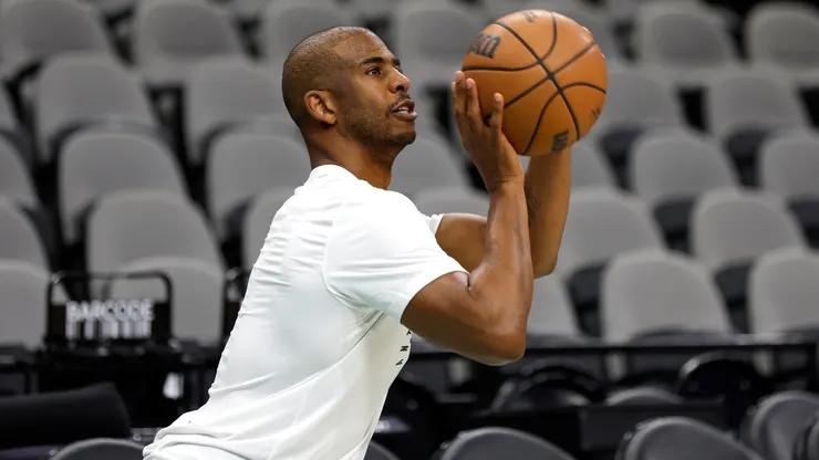 Chris Paul #3 of the San Antonio Spurs takes warm up shots before their game against the Toronto Raptors at Frost Bank Center on April 13, 2025 in San Antonio, Texas.