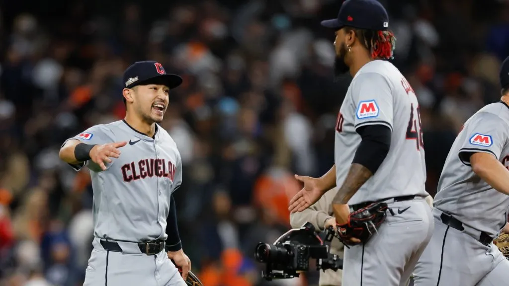 Steven Kwan #38 and Emmanuel Clase #48 of the Cleveland Guardians celebrate after a win over the Detroit Tigers during Game Four of the Division Series at Comerica Park on October 10, 2024 in Detroit, Michigan. (Photo by Duane Burleson/Getty Images)