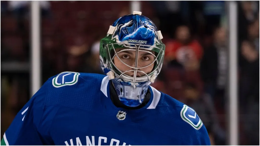 Goalie Michael DiPietro #75 of the Vancouver Canucks during the team warm up prior to NHL action against the Calgary Flames on February, 9, 2019 at Rogers Arena in Vancouver, British Columbia, Canada.