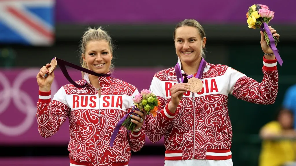 Bronze medalists Maria Kirilenko and Nadia Petrova pose with their medals during the medal ceremony of the London 2012 Olympic Games. (Clive Brunskill/Getty Images)