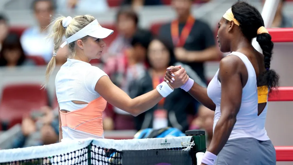 Maria Kirilenko of Russia congratulates Serena Williams of the United States after their match at the China Open. (Matthew Stockman/Getty Images)
