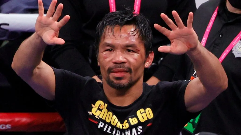 Manny Pacquiao gestures to fans after his WBA welterweight title fight against Yordenis Ugas at T-Mobile Arena on August 21, 2021. (Source: Ethan Miller/Getty Images)