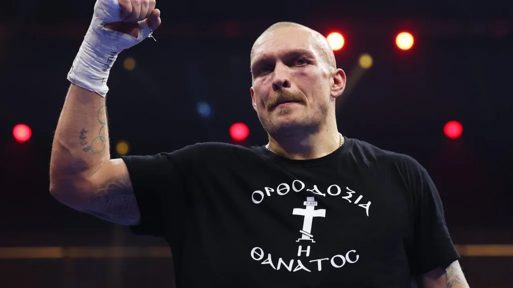 Oleksandr Usyk celebrates victory following the IBF, IBO, WBA, WBC and WBO Undisputed World Heavyweight titles’ fight in 2024. (Source: Richard Pelham/Getty Images)