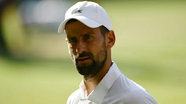Novak Djokovic looks on against Jannik Sinner during Wimbledon.