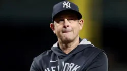 Yankees manager Aaron Boone reacts in the dugout after a costly baserunning mistake during a pivotal moment against the Braves.