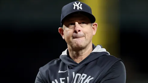 Yankees manager Aaron Boone reacts in the dugout after a costly baserunning mistake during a pivotal moment against the Braves.