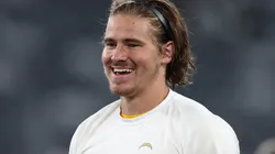 Justin Herbert #10 of the Los Angeles Chargers warms up before the game against the New York Jets at MetLife Stadium on November 06, 2023 in East Rutherford, New Jersey.